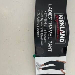 TWO pairs of Kirkland travel pants.